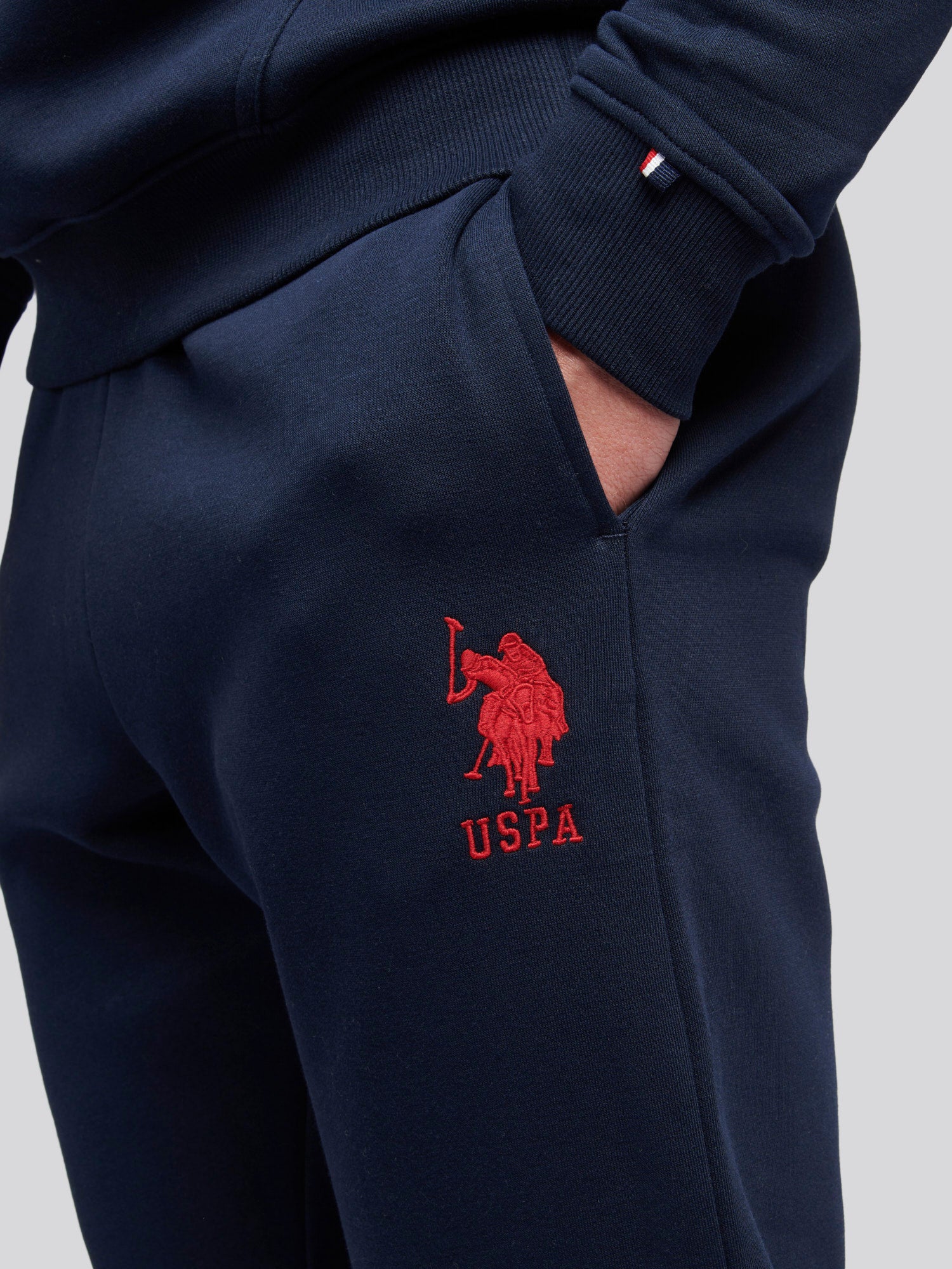 Mens Player 3 Joggers in Dark Sapphire Navy/Haute Red DHM - Image 2